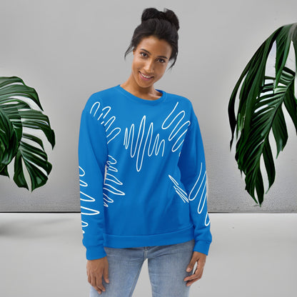 Woman wearing a Good Wishes 365 navy blue recycled sweatshirt with white abstract scribble lines and ribbed cuffs.