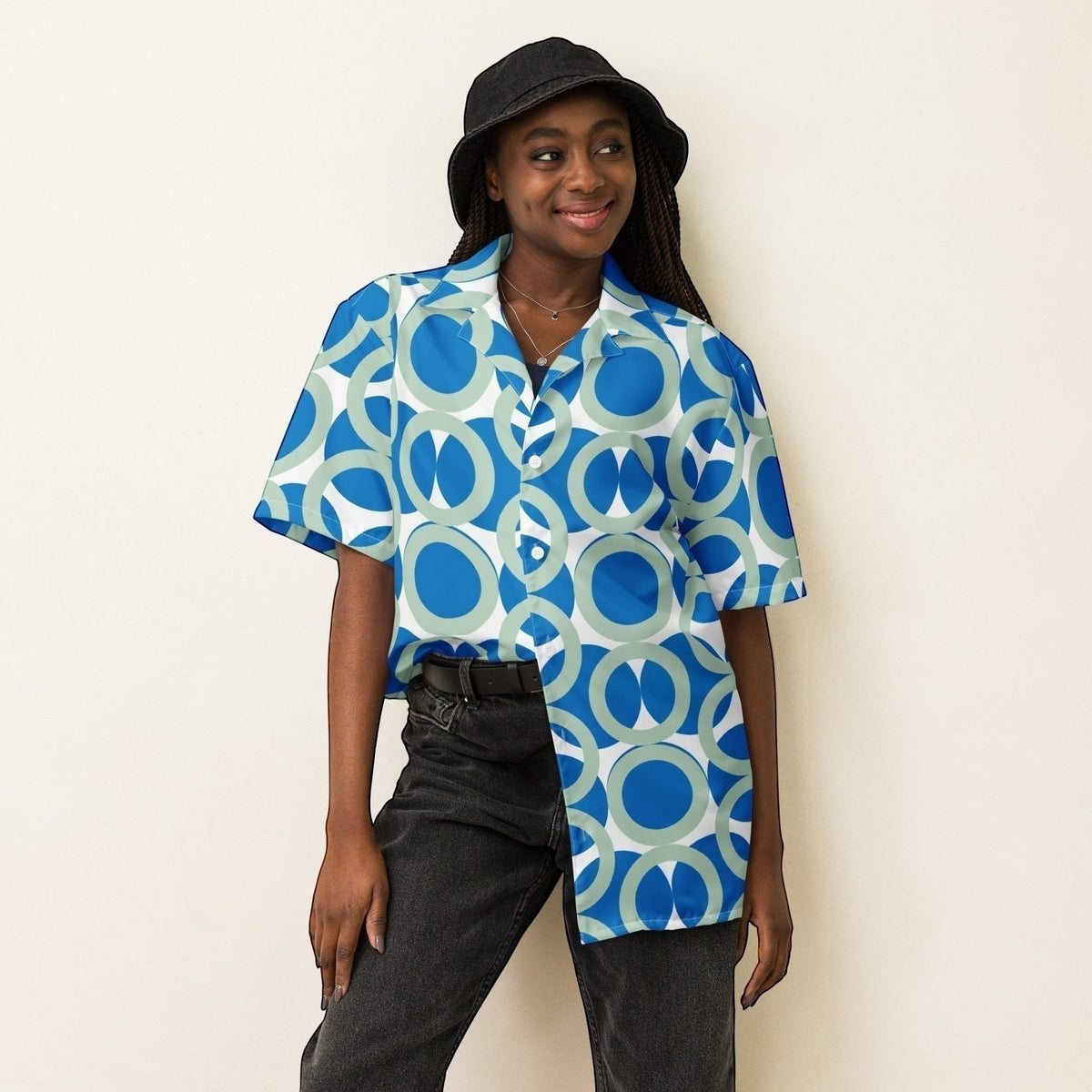 Good Wishes 365 navy blue retro geometric short sleeve button shirt worn by a woman with a black bucket hat