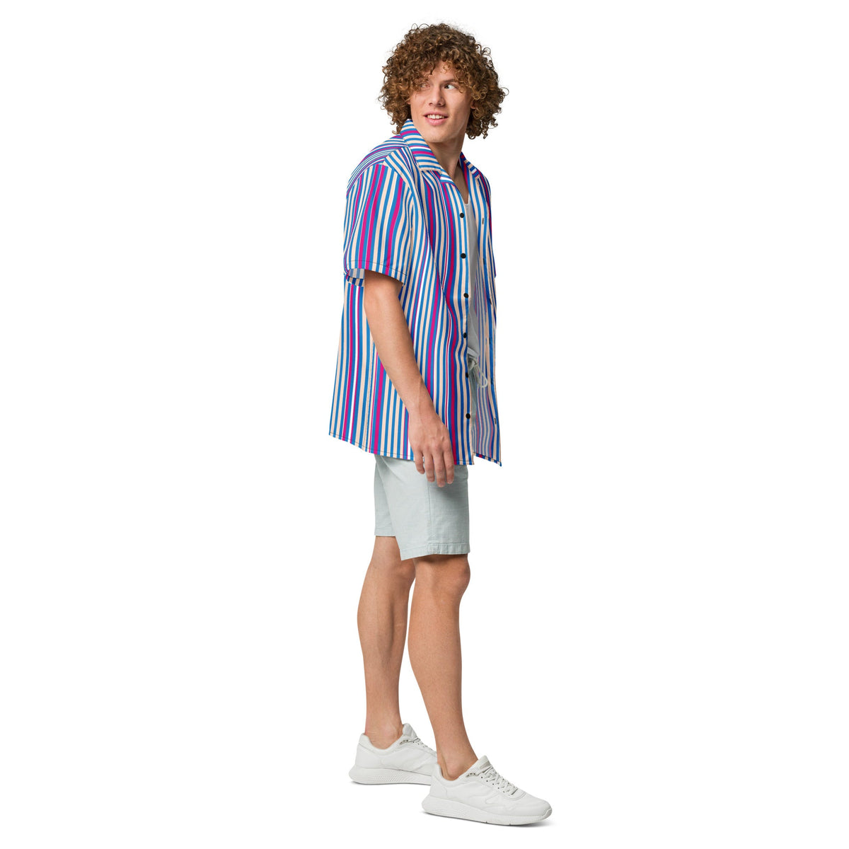 Good Wishes 365 navy blue striped short sleeve button shirt with magenta and white accents worn by a curly-haired man.
