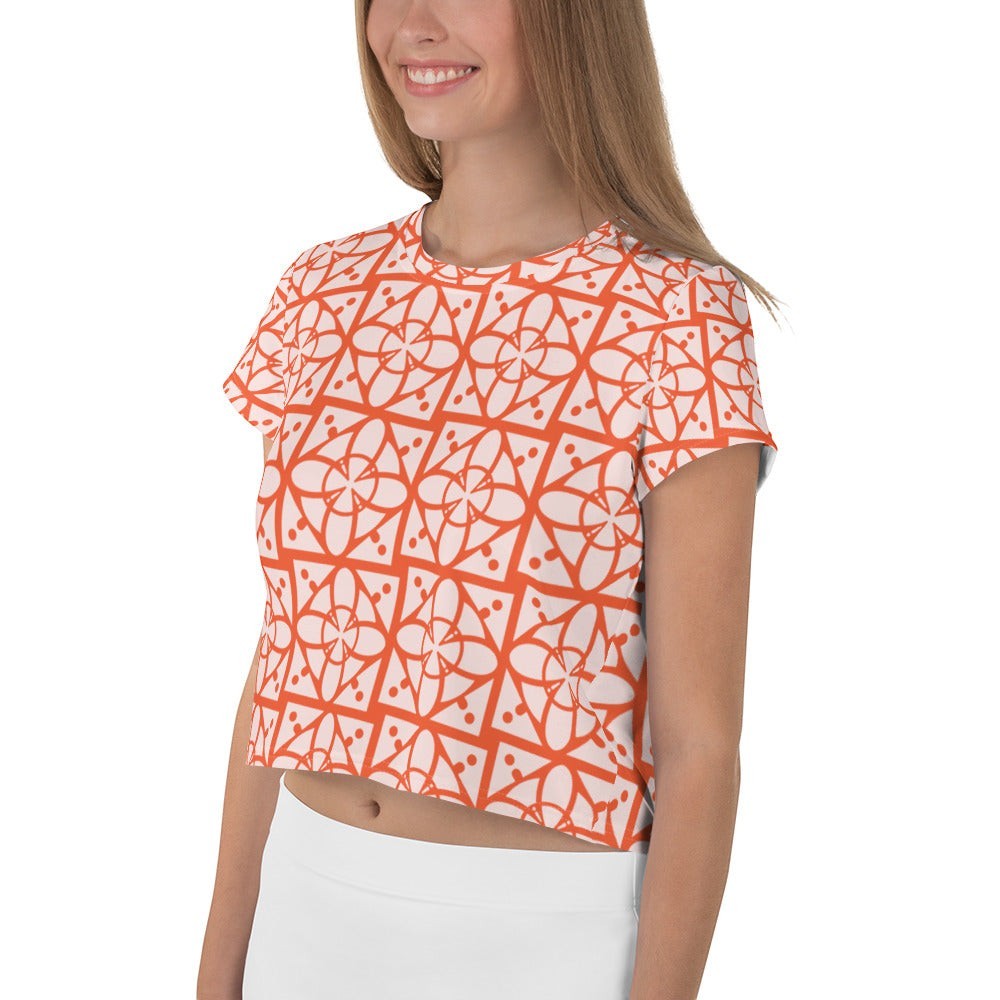 Good Wishes 365 crop tee featuring an orange and white geometric all-over print in a premium stretch jersey fabric.