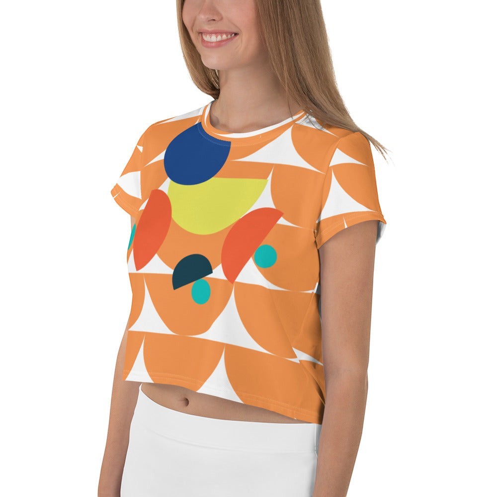 Good Wishes 365 orange crop tee with geometric mushroom graphic print, crew neck, and short sleeves on a model