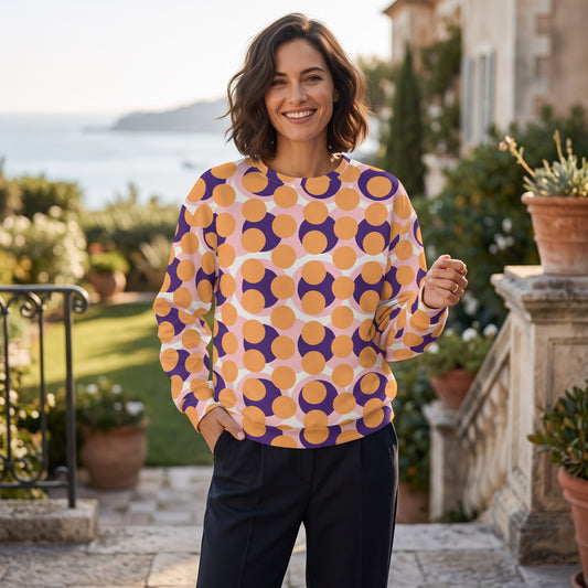 Good Wishes 365 women's recycled fleece sweatshirt with a 70s pop art orange and purple abstract circle print