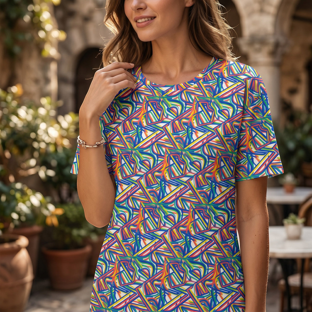 Good Wishes 365 oversize t-shirt dress featuring a vibrant multi-colored abstract geometric pattern on stretch fabric.