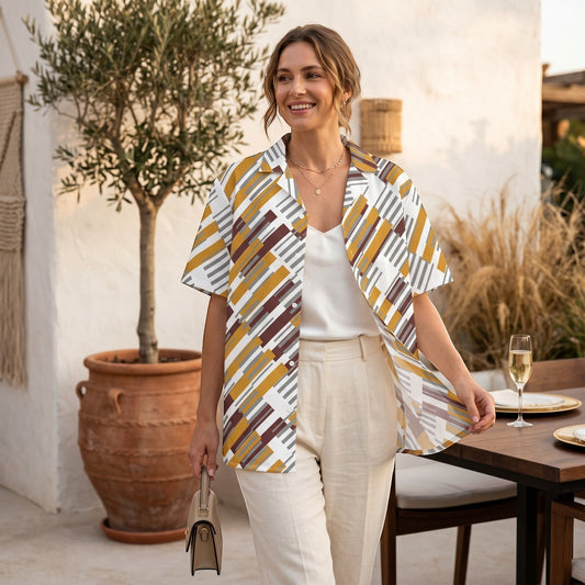 Good Wishes 365 oversized button shirt with a geometric pattern in yellow, brown, and grey, worn by a smiling woman.