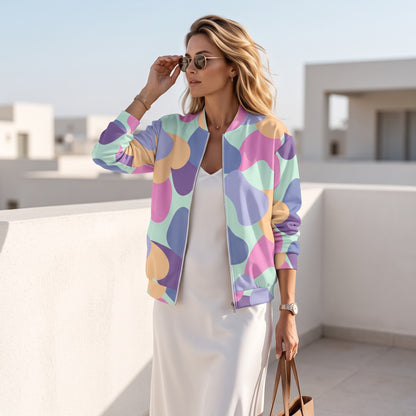Good Wishes 365 unisex bomber jacket with pastel all-over print, featuring a silver zipper and brushed fleece lining.
