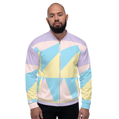 Good Wishes 365 unisex bomber jacket with a pastel geometric print in blue, yellow, and lavender on a male model.