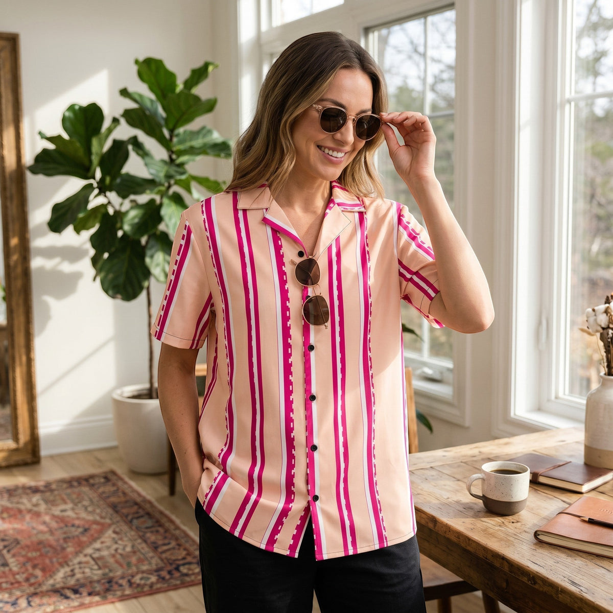Good Wishes 365 retro pastel blush button shirt with magenta stripes, camp collar, and short sleeves on a woman.