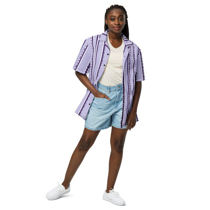 Model wearing a Good Wishes 365 retro pastel violet and white striped short sleeve button-down shirt with denim shorts.