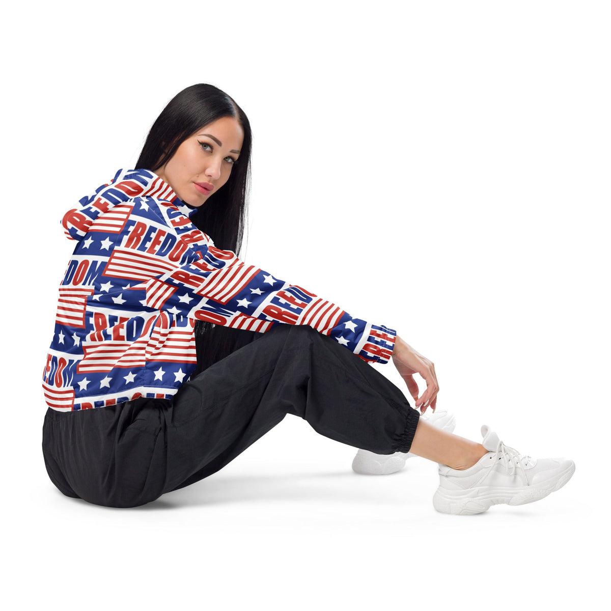 Good Wishes 365 women's cropped windbreaker with USA flag and Freedom print, worn by a model with black joggers.