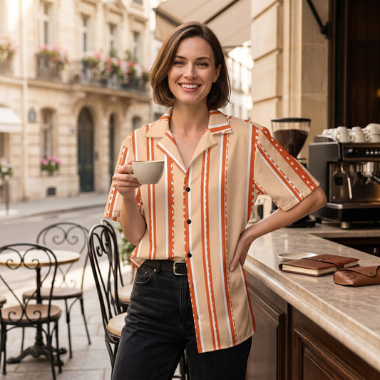 Good Wishes 365 women's retro pastel peach striped short sleeve button shirt with a camp collar worn at a cafe.
