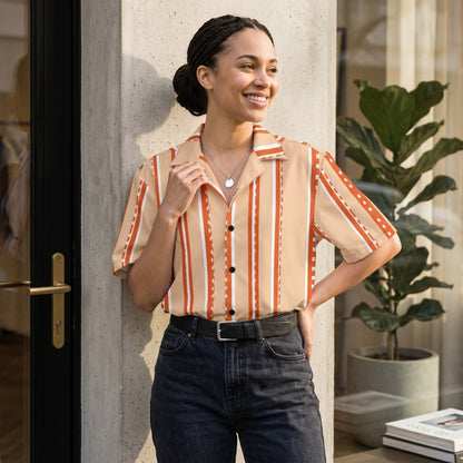 Good Wishes 365 retro pastel peach striped short sleeve button shirt worn by a smiling woman with braided hair.