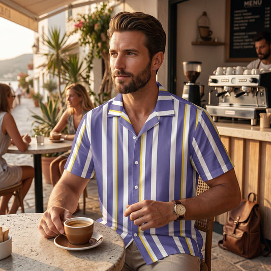 Good Wishes 365 men's periwinkle, white, and yellow vertical striped short sleeve camp collar shirt at a cafe.