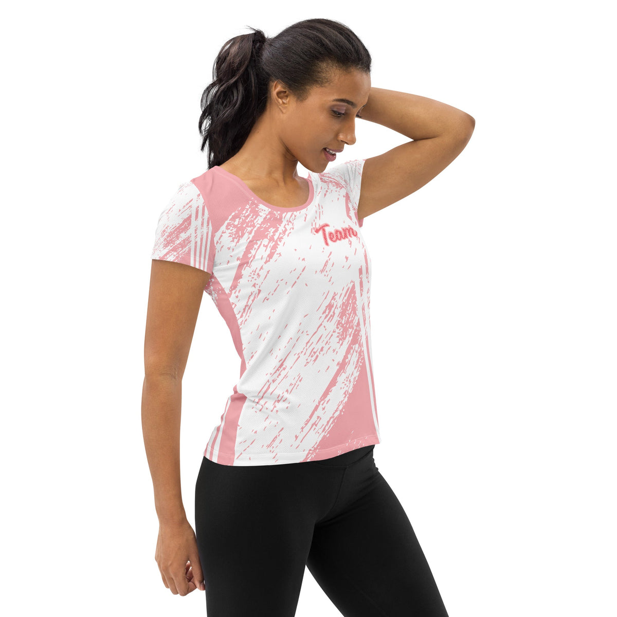 Good Wishes 365 women's athletic t-shirt in pink and white with abstract stripe print and Team graphic on model