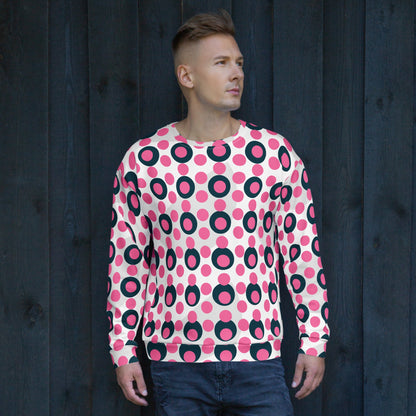 Good Wishes 365 unisex sweatshirt featuring a vibrant rose pink and charcoal polka dot print on a cream background.