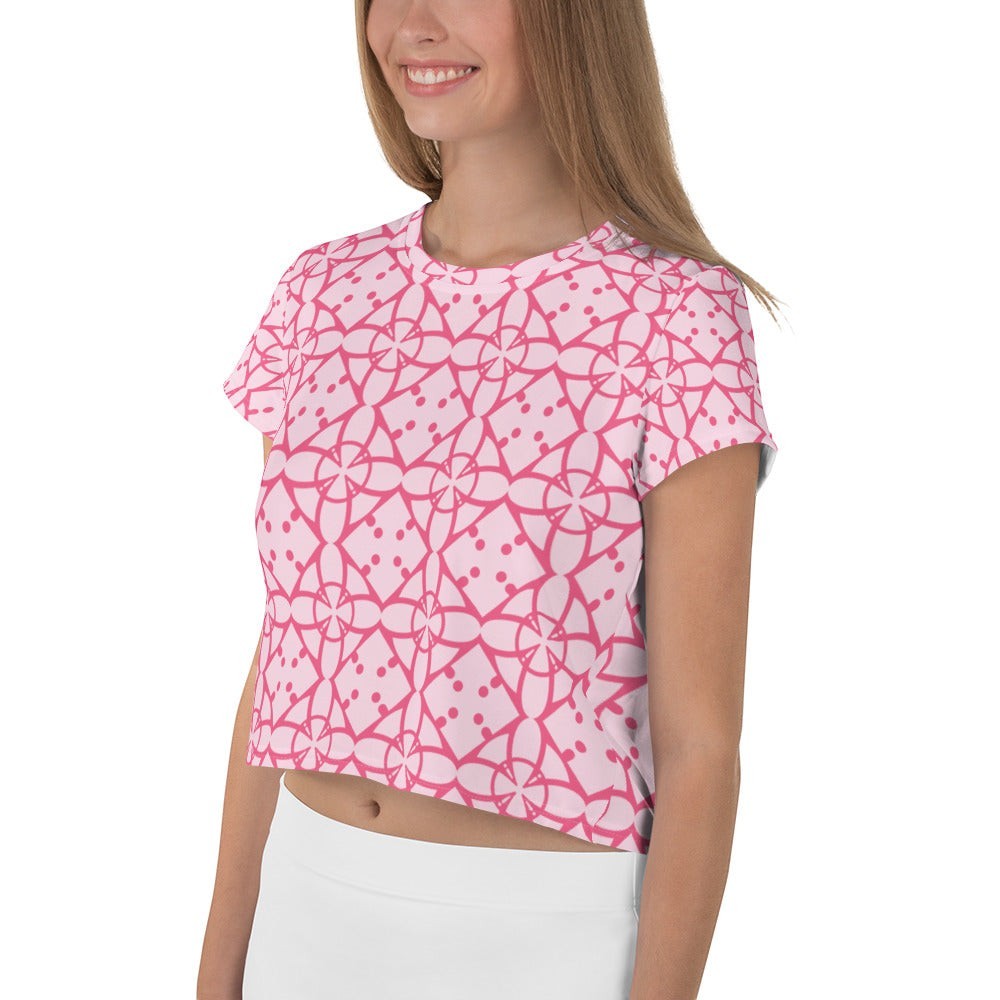 Good Wishes 365 pink and blush geometric print short sleeve crew neck crop tee worn by a smiling woman