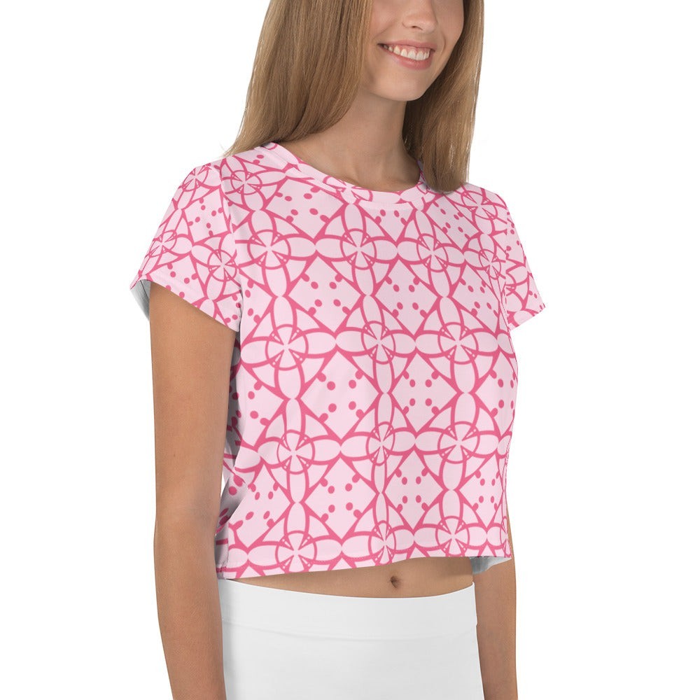 Good Wishes 365 pink and blush geometric print short sleeve crew neck crop tee worn by a smiling woman