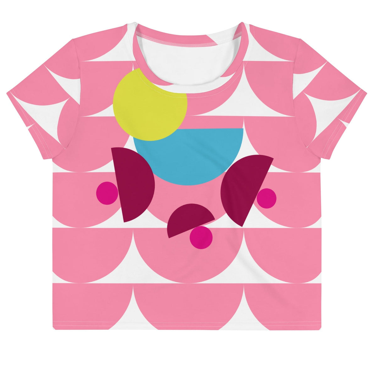 Good Wishes 365 pink crop tee featuring a geometric mushroom graphic with yellow, blue, and magenta accents.