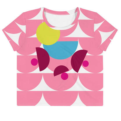 Good Wishes 365 pink crop tee featuring a geometric mushroom graphic with yellow, blue, and magenta accents.