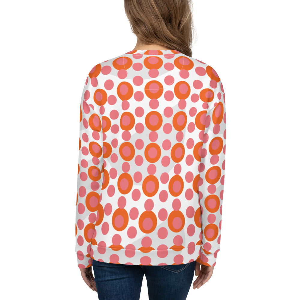 Good Wishes 365 recycled sweatshirt with a 70s pop art pink and orange polka dot pattern, back view on a woman.