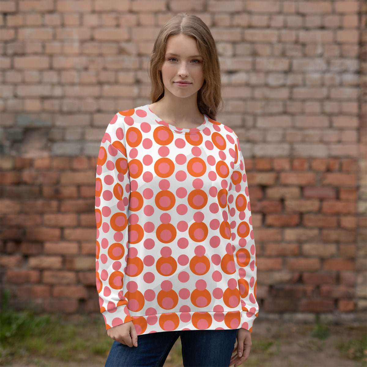 Good Wishes 365 women's recycled sweatshirt featuring a pink and orange 70s pop art polka dot pattern.