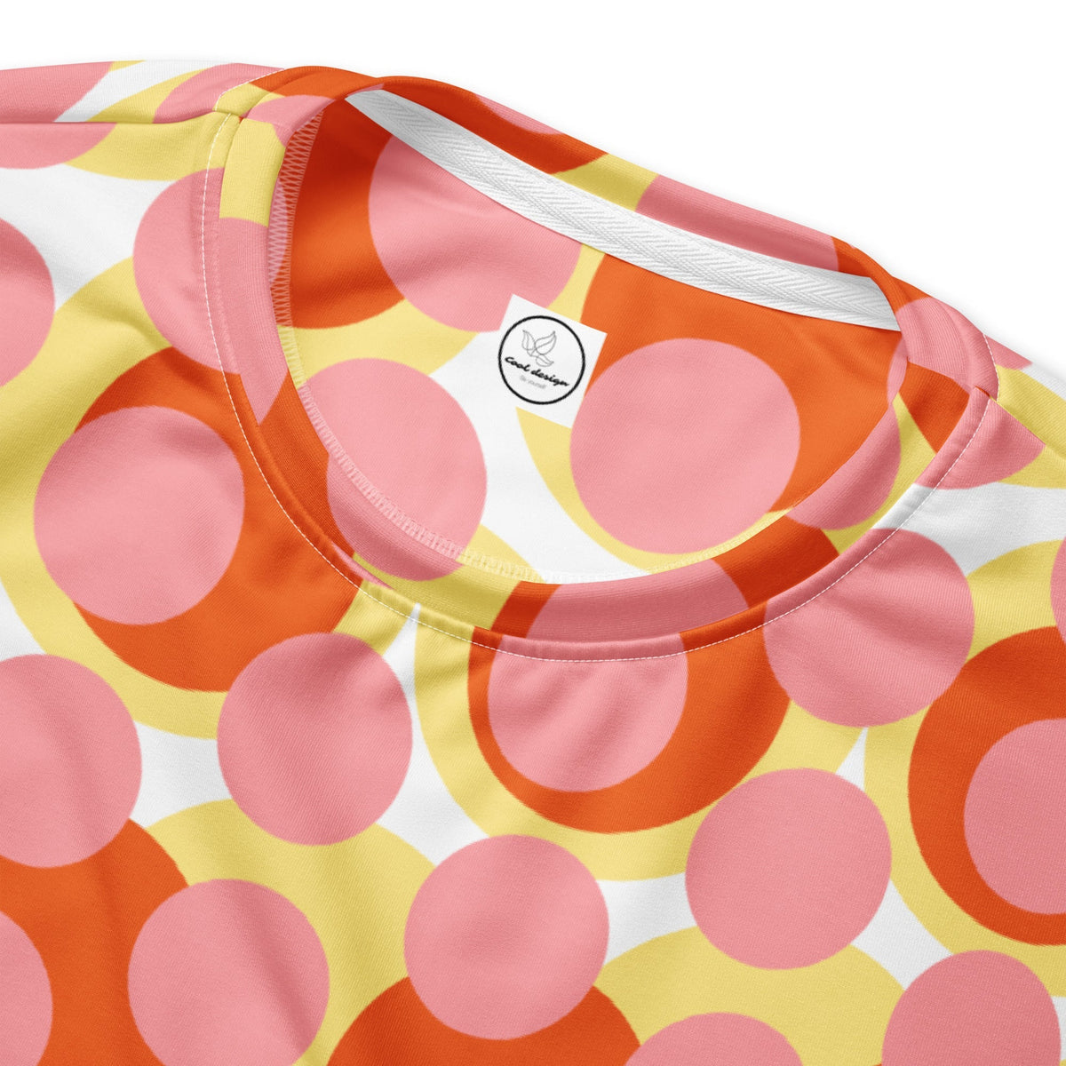 Good Wishes 365 recycled sweatshirt featuring a 70s pop art geometric print in pink, orange, and yellow.