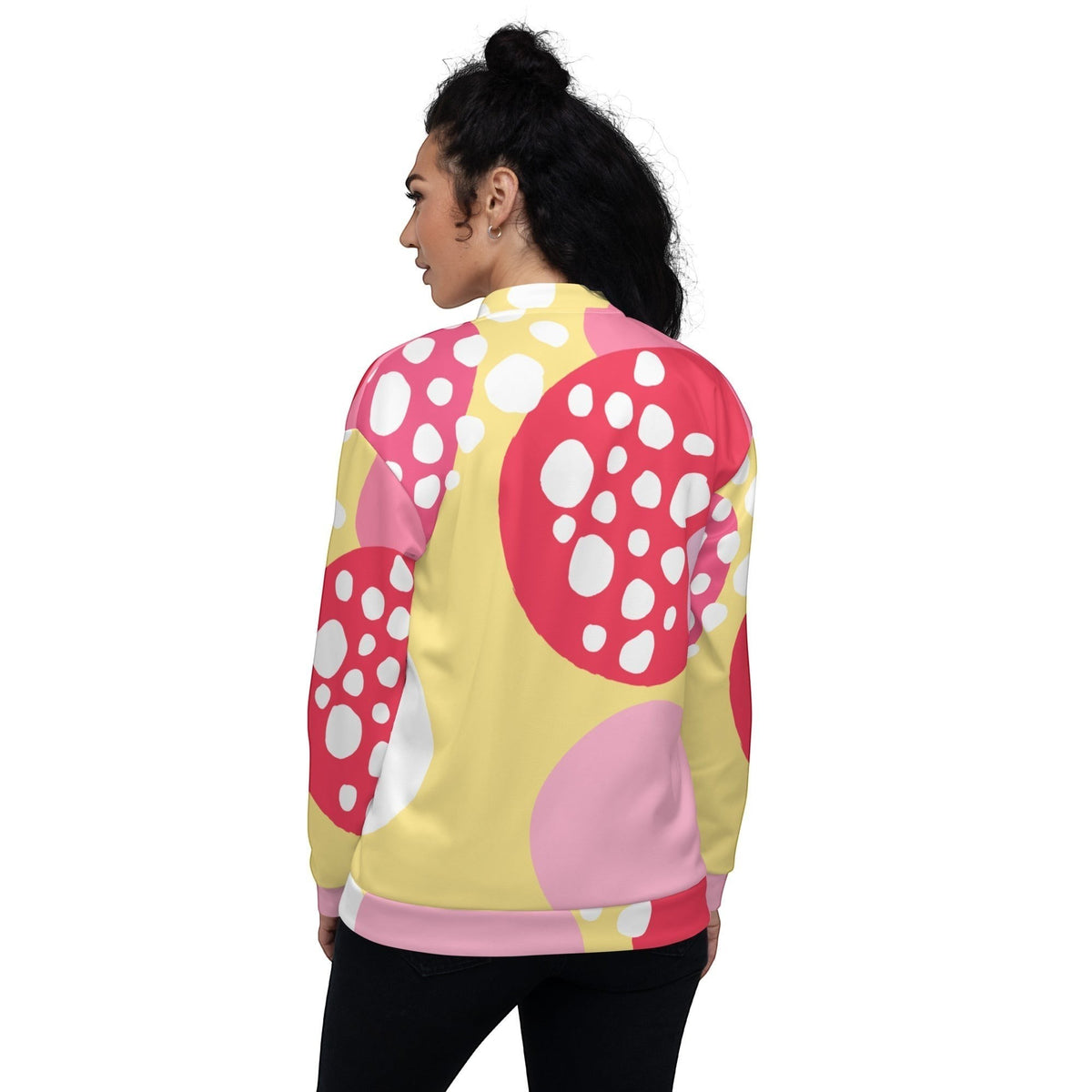 Good Wishes 365 unisex bomber jacket featuring a vibrant pink and yellow abstract strawberry print, back view