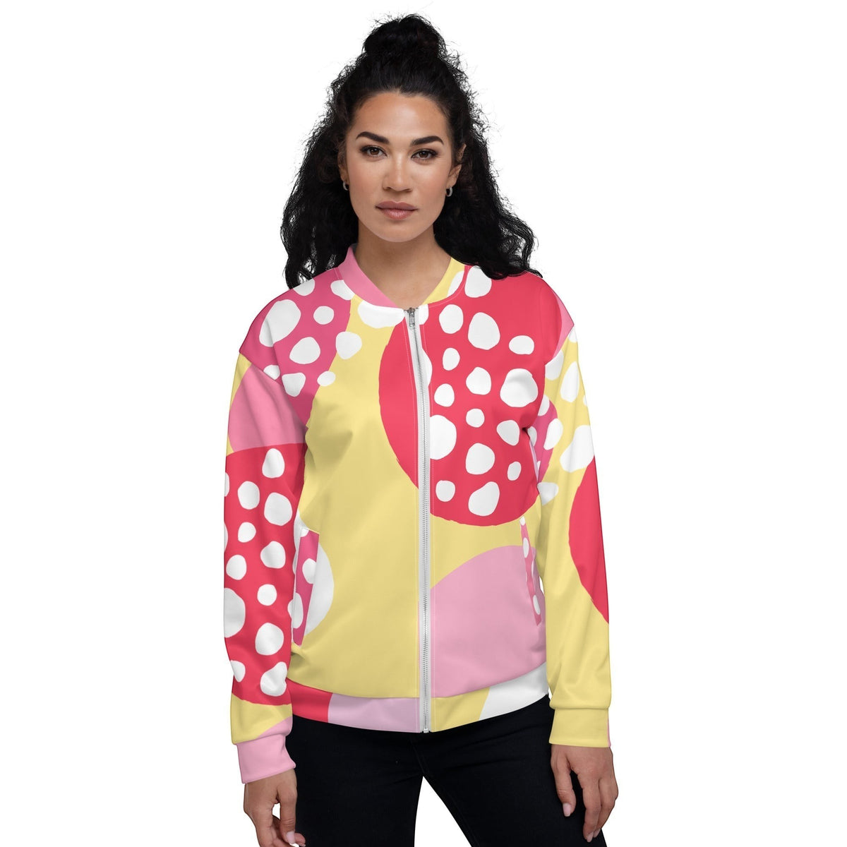 Good Wishes 365 unisex bomber jacket featuring a vibrant pink, yellow, and white abstract strawberry print pattern.
