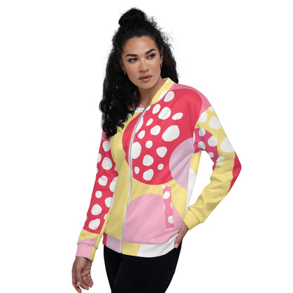 Good Wishes 365 unisex bomber jacket featuring a vibrant pink, yellow, and white abstract strawberry print on a model.