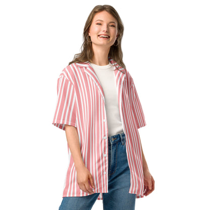 Good Wishes 365 pink and white vertical striped button-up resort shirt worn open over a white tee and blue jeans.