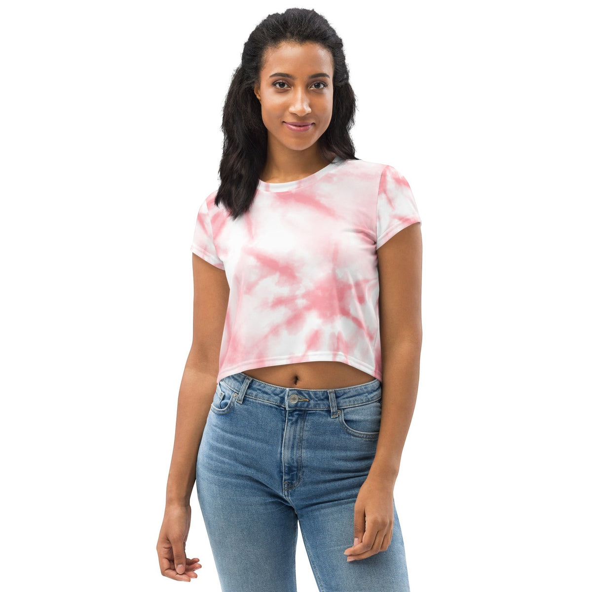 Good Wishes 365 pink and white tie-dye crew neck crop top worn by a woman with high-waisted blue jeans