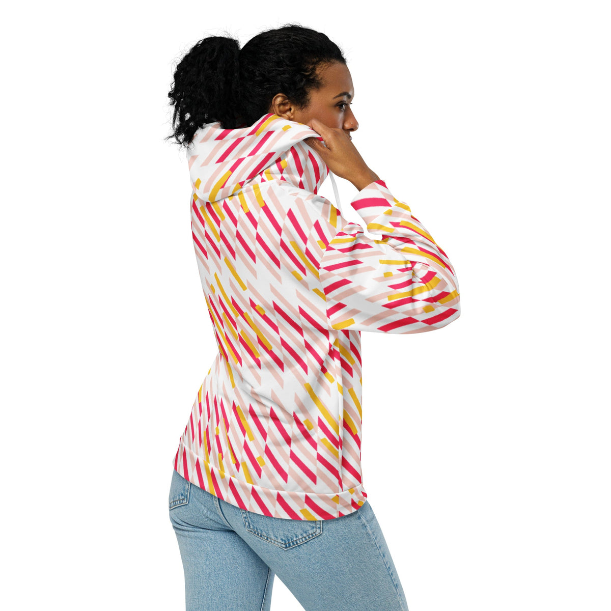 Good Wishes 365 pink and yellow geometric print recycled zip hoodie worn by a woman, side view