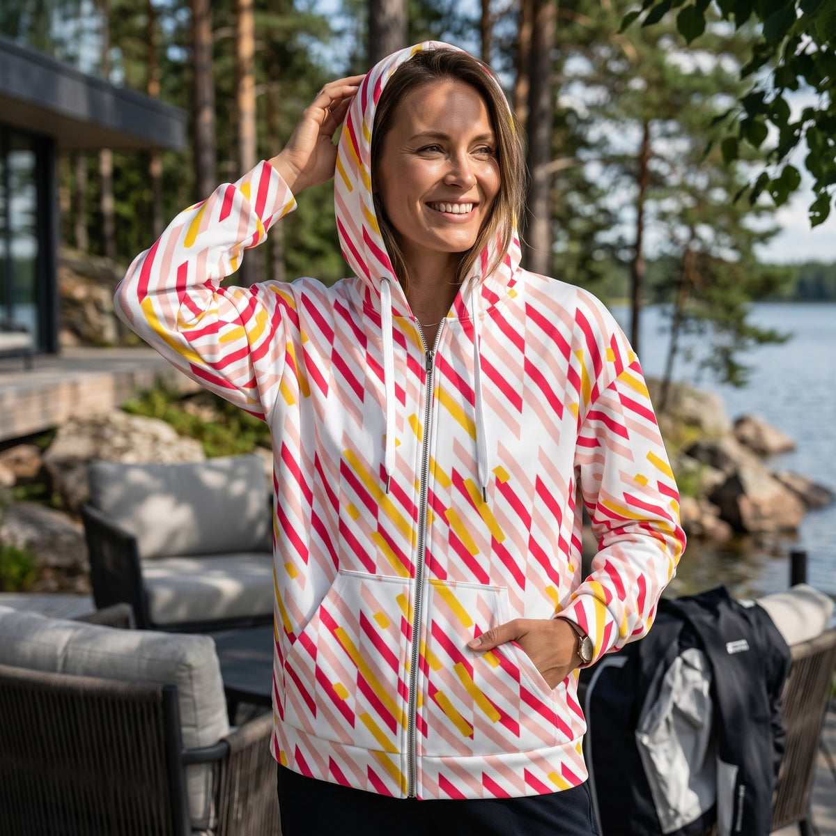 Good Wishes 365 women's zip hoodie with a pink and yellow geometric line print, featuring a cozy fleece-lined hood.
