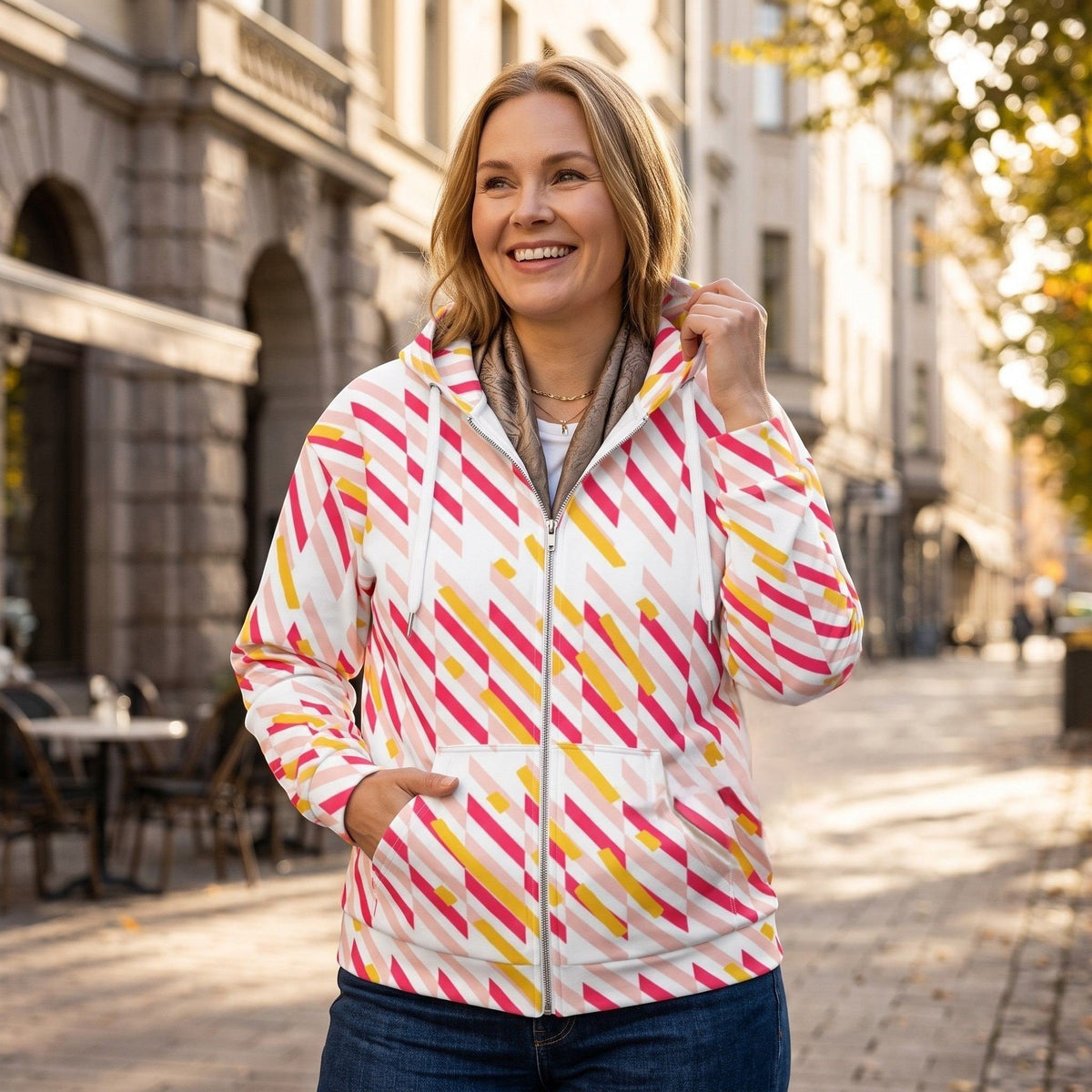Good Wishes 365 women's zip hoodie with pink and yellow geometric lines, featuring a cozy fleece lining and hood.