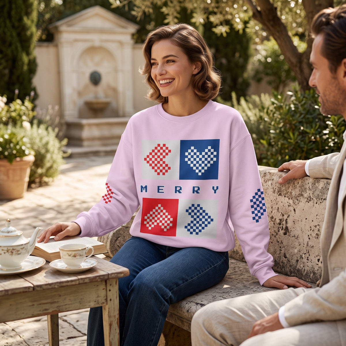Good Wishes 365 light lavender recycled unisex sweatshirt with pixelated Merry hearts print worn by a smiling woman.
