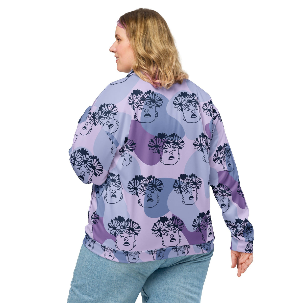 Good Wishes 365 unisex bomber jacket featuring a purple abstract flowercrown face print, worn by a blonde woman.