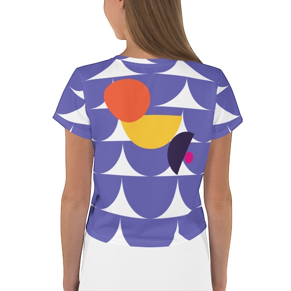 Good Wishes 365 purple crop tee with geometric mushroom graphic print, back view on a woman