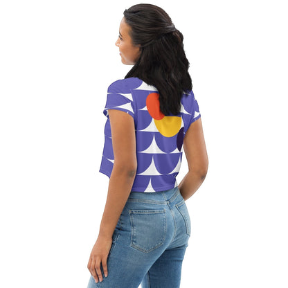 Good Wishes 365 purple crop tee with geometric mushroom print worn by a woman seen from the back