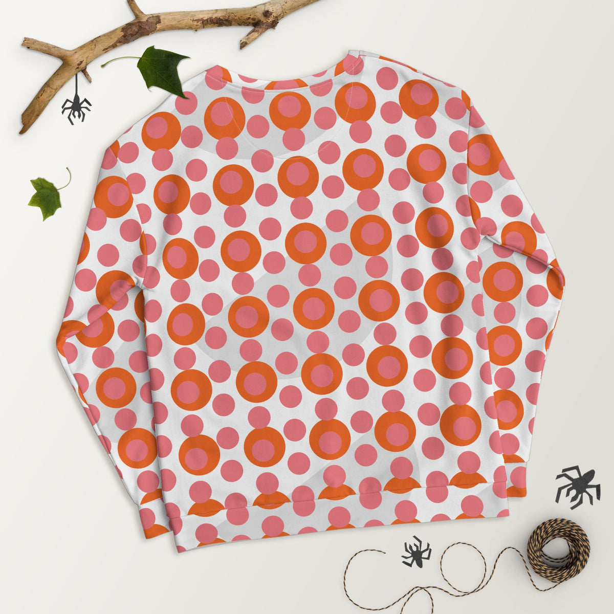 Good Wishes 365 recycled sweatshirt featuring a 70s pop art pink and orange polka dot pattern on a white background