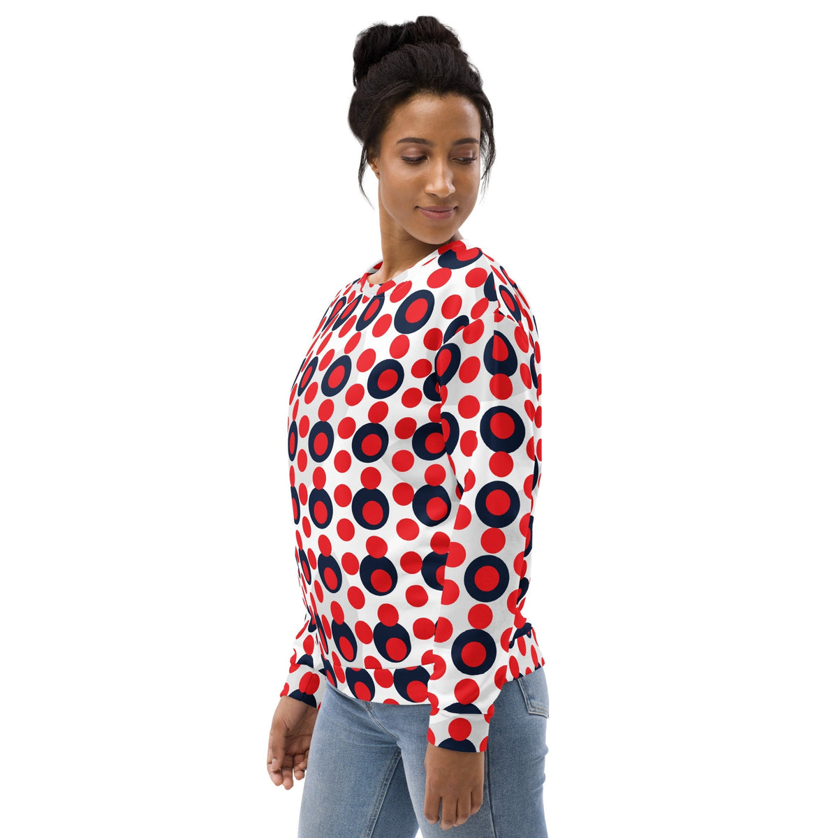 Model wearing a Good Wishes 365 recycled sweatshirt with a red and navy polka dot pop art print and crew neck.