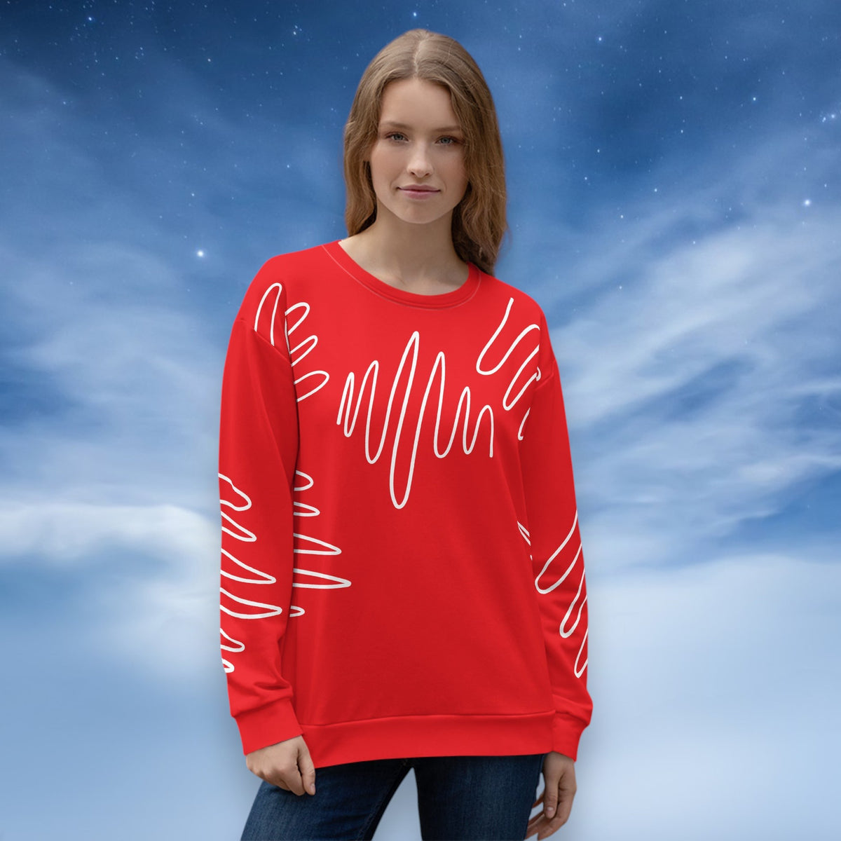 Good Wishes 365 red recycled sweatshirt with white abstract scribble lines worn by a woman against a starry sky