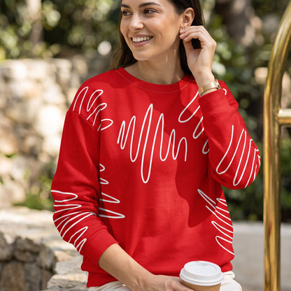 Good Wishes 365 red recycled sweatshirt featuring a white abstract scribble pattern, worn by a smiling woman outdoors.