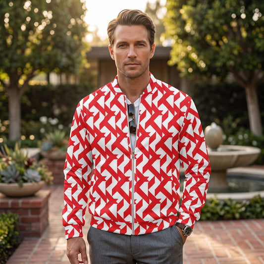 Good Wishes 365 unisex bomber jacket in red and white geometric maze print with a silver zipper, worn by a man.