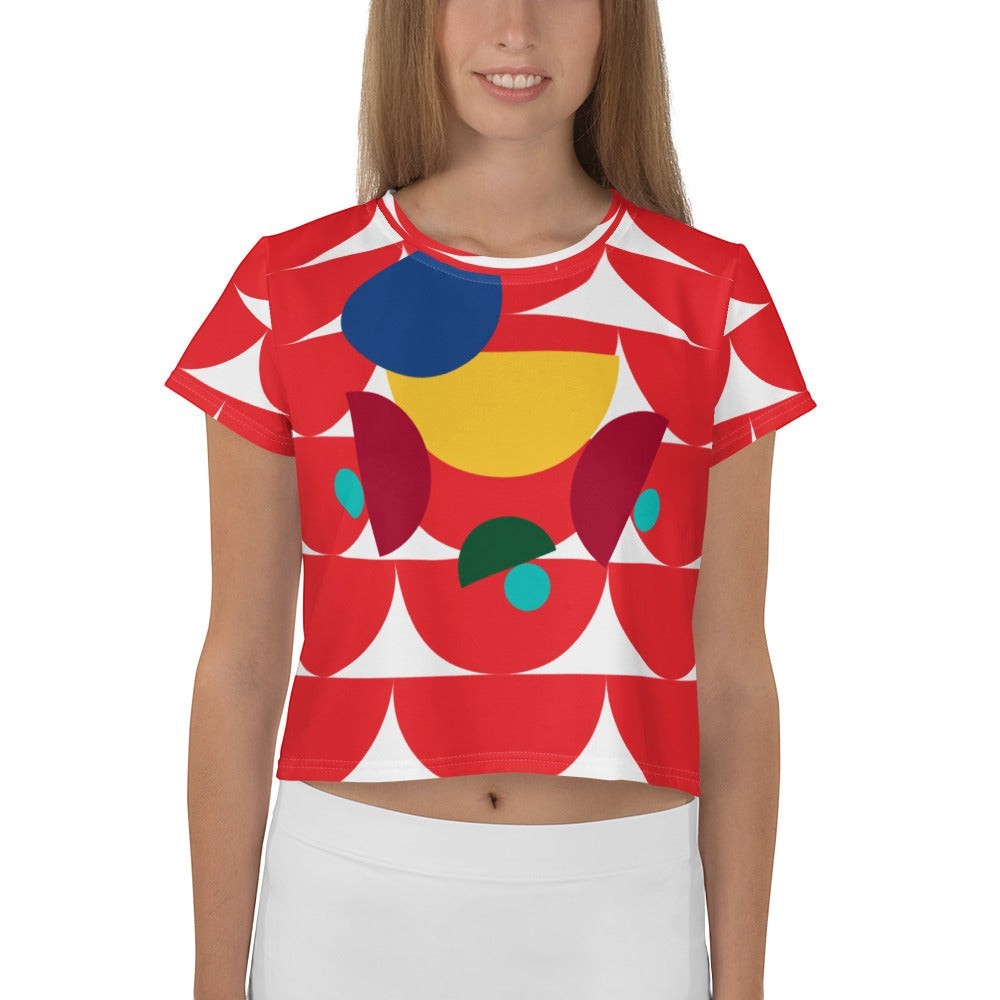 Good Wishes 365 red crop tee featuring a vibrant geometric mushroom graphic with yellow, blue, and teal accents.