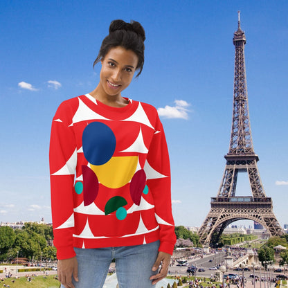 Good Wishes 365 red recycled sweatshirt with geometric mushroom graphic print worn by a woman in front of Eiffel Tower