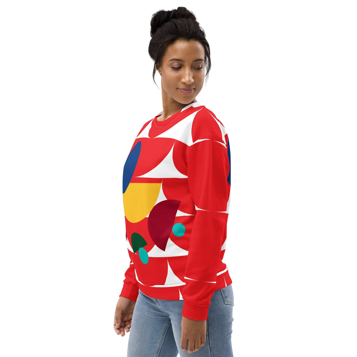 Good Wishes 365 red recycled sweatshirt with geometric mushroom all-over print worn by a woman in jeans