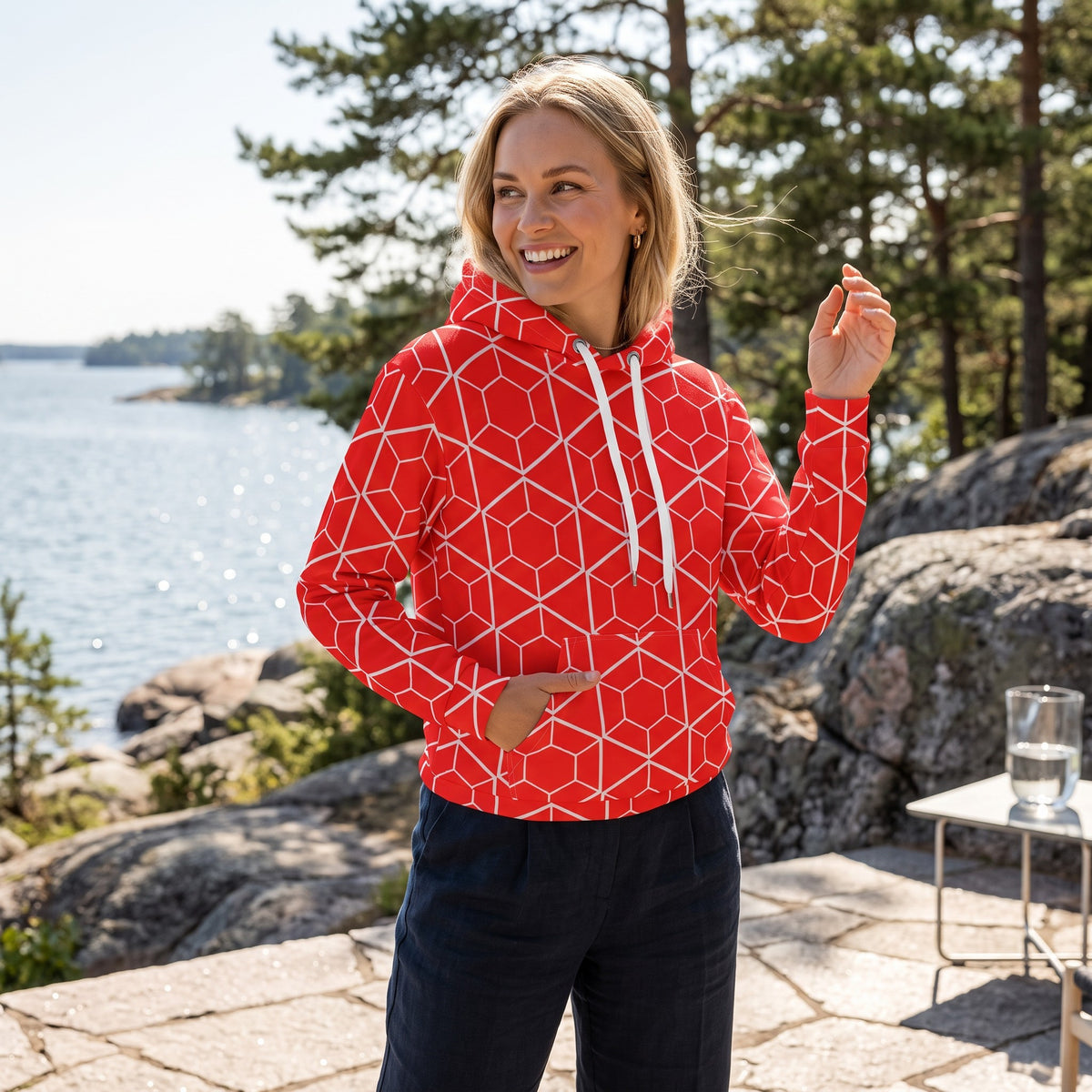 Good Wishes 365 red recycled hoodie with white geometric hexagon print, featuring a kangaroo pocket and drawstring hood.