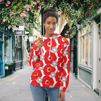 Good Wishes 365 recycled hoodie featuring a red and gray floral print worn by a woman on a city street