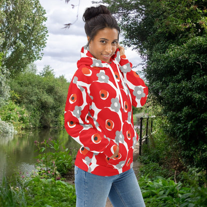 Good Wishes 365 recycled hoodie featuring a red and gray floral print, worn by a woman on a canal path.