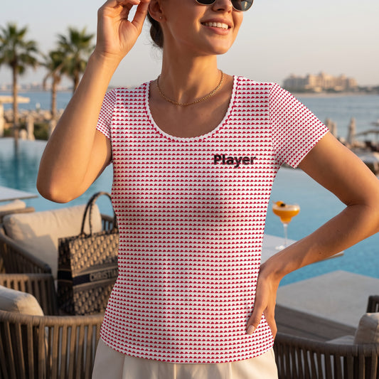 Good Wishes 365 women's athletic t-shirt with red triangle print and Player graphic, worn by a woman at a pool deck.