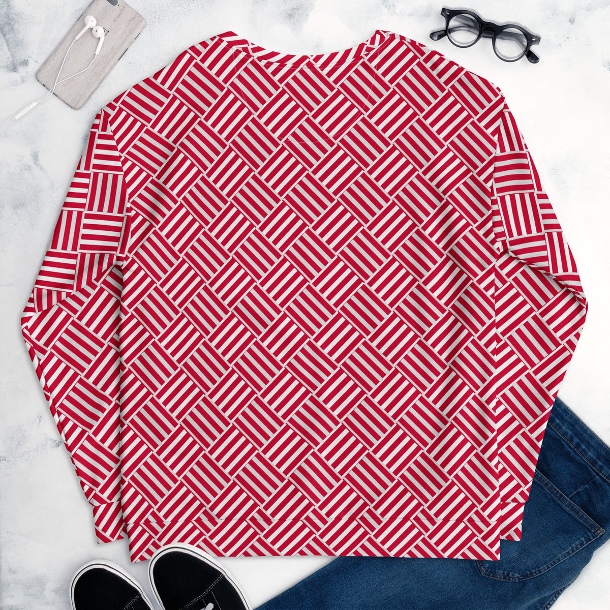 Good Wishes 365 unisex sweatshirt featuring a red and white geometric basketweave print on a flat lay background.